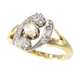 Elegant estate diamond and pearl engagement ring
